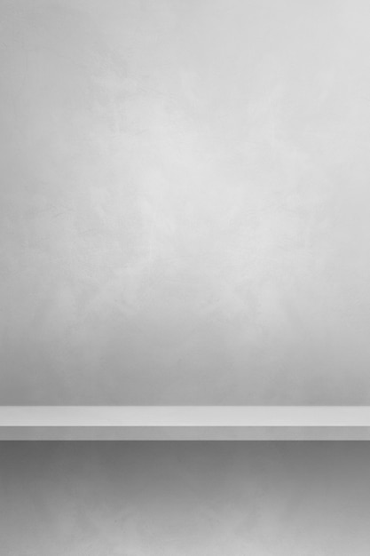 Photo empty shelf on a white wall. background template scene. vertical backdrop