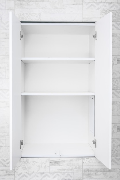 Empty shelves for product display clean white cabinet light\
grey wall background empty white open cabinet with shelves in\
bathroom copy space