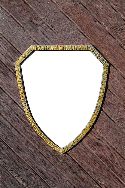 Empty shield poster on diagonal wooden plank background.