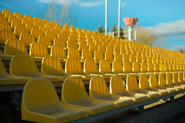 Photo empty sits on a tribune on a stadium due to virus