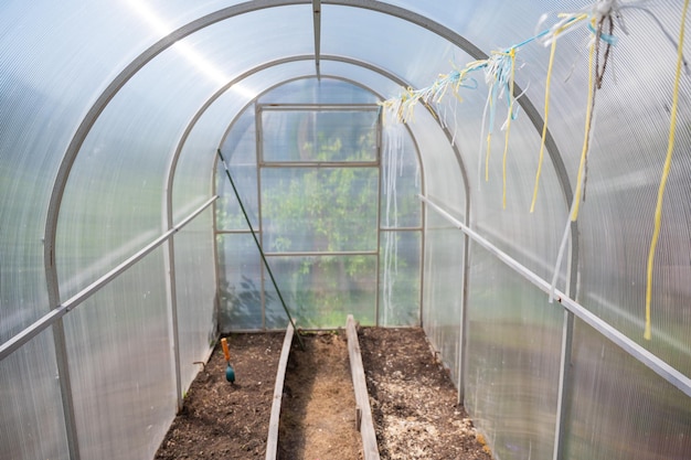 Empty small greenhouse in the countryside