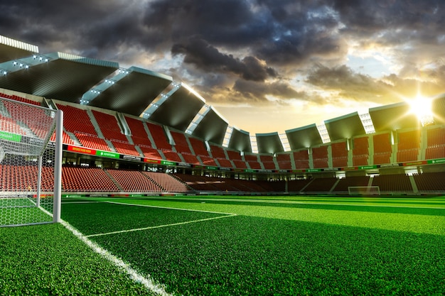 Empty soccer stadium without fans in the evening light