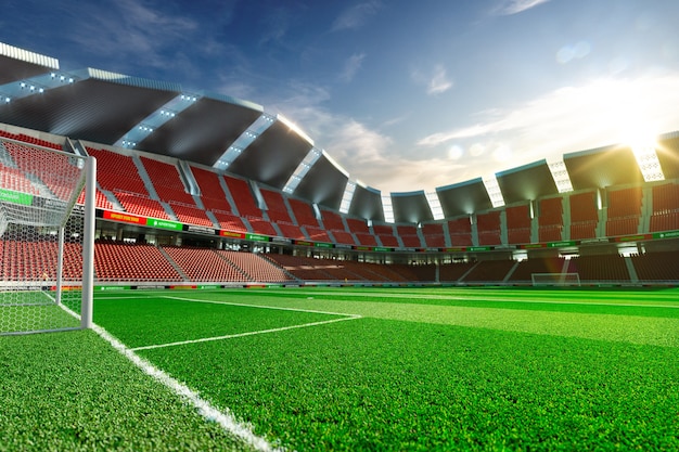 Empty soccer stadium without fans in the evening sunlight