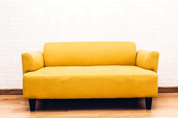 Empty sofa against wall at home