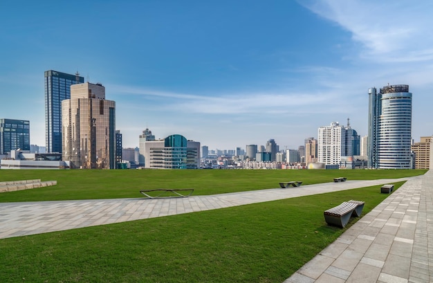 Empty square and cityscape skyline