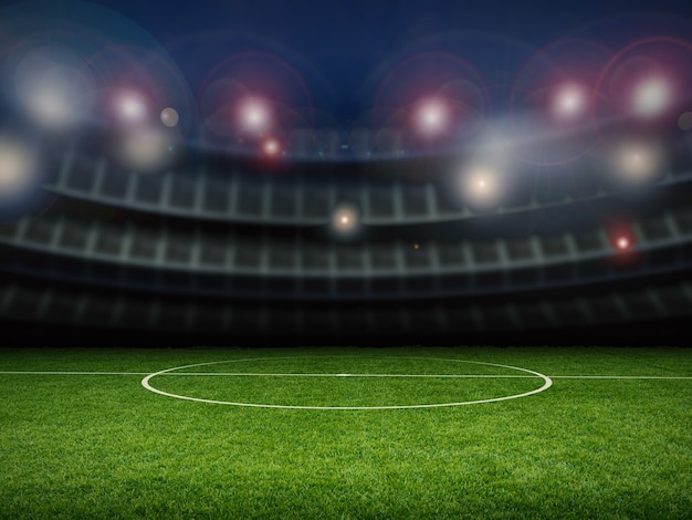 Empty stadium with soccer field at night