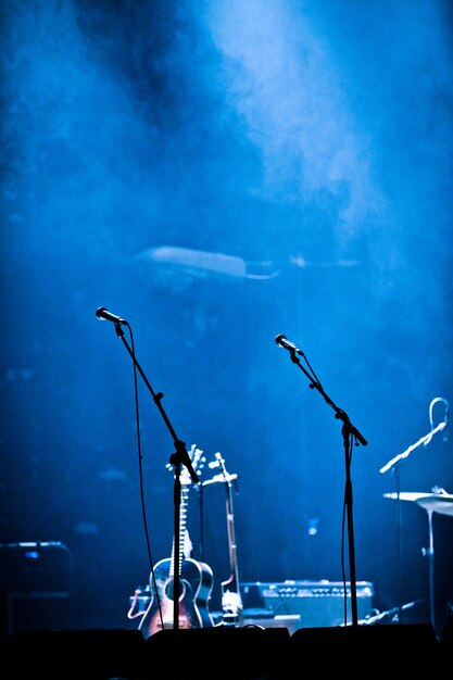 Empty Stage and Fog with Microphones and Guitar