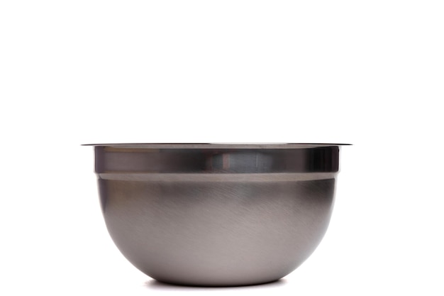 Empty stainless steel salad bowl on white background metal bowl