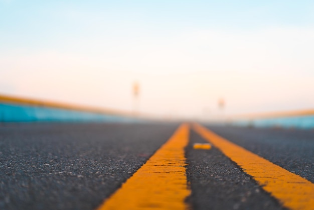 Photo empty street with clean sky for background safety road and insurance concept