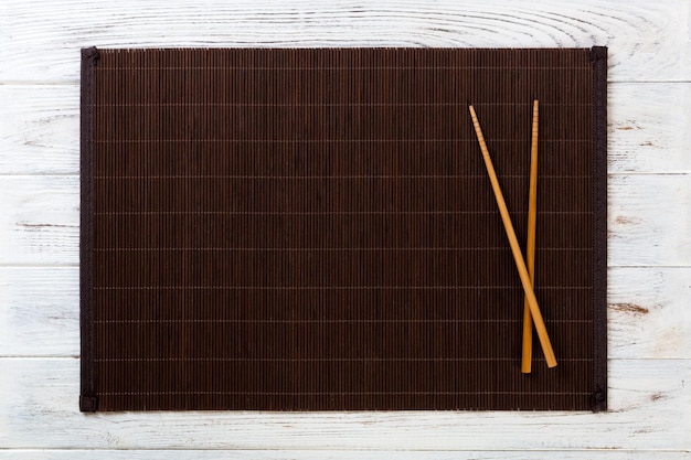 Empty sushi mat on colored background top view with space for your design