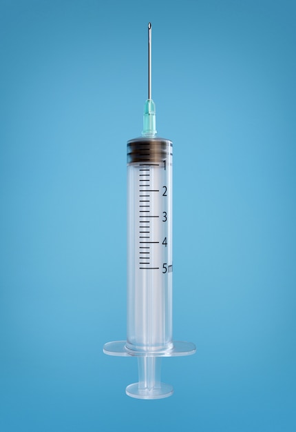 青色の背景に分離された注射用の空の注射器