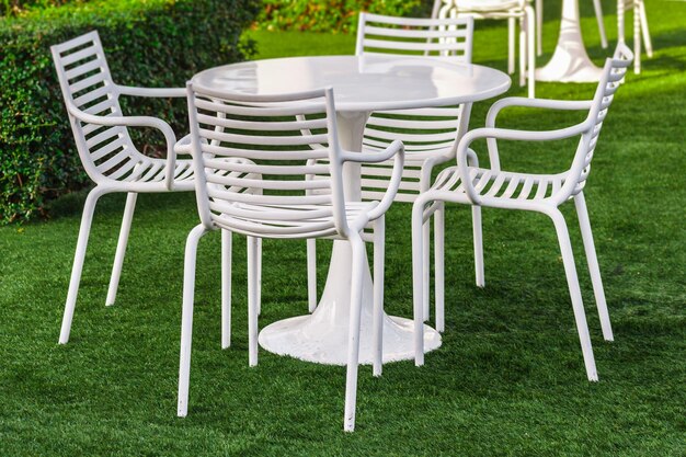 Empty table and chairs at park