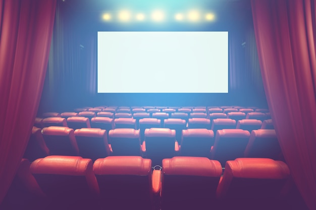 empty theater with screen and red seats 