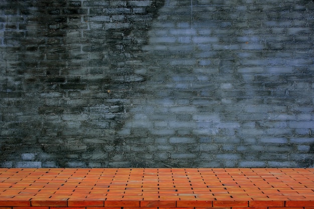 Photo empty top of brick floor and natural stone wall background