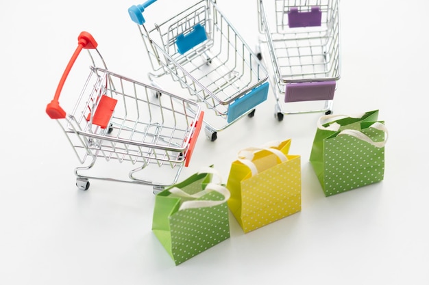 Empty top view mini shopping cart or trolley shopping on white background concept shopping in supermarket