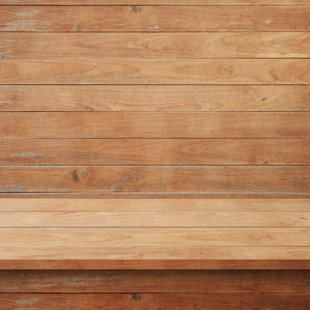 Empty top Wood shelves or table on wall background.