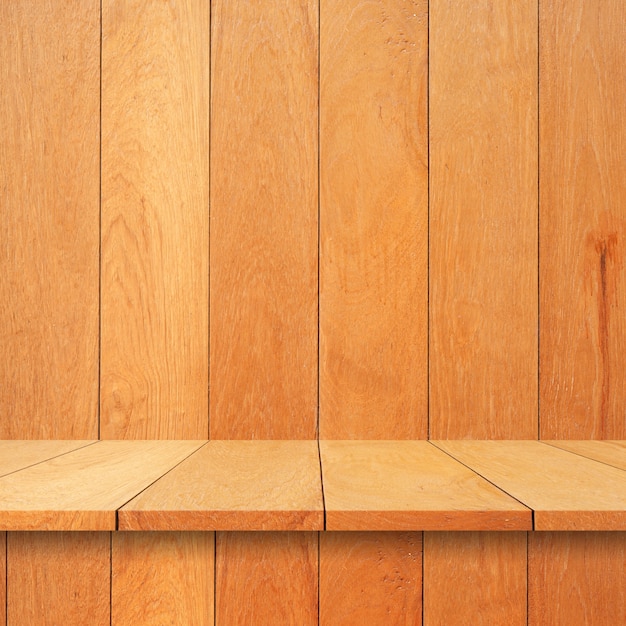 Empty top Wood shelves or table on wall background.