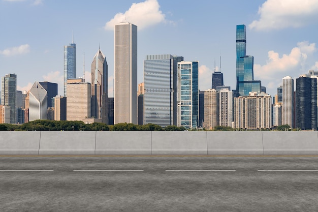 Empty urban asphalt road exterior with city buildings
background new modern highway concrete construction concept of way
to success transportation logistic industry fast delivery chicago
usa