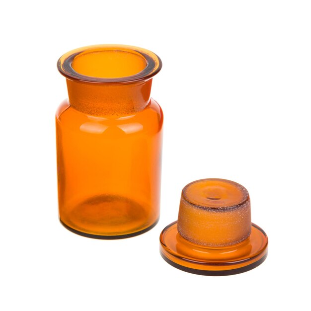 Empty vintage apothecary bottle with open lid