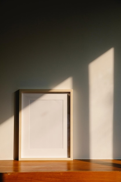 Empty wall photo frame mockup