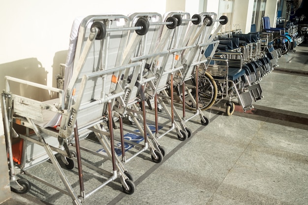 Empty wheelchairs parked in hospital