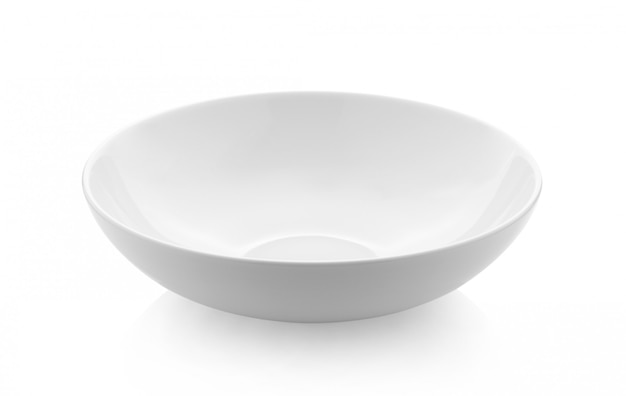 Empty white bowl on white surface