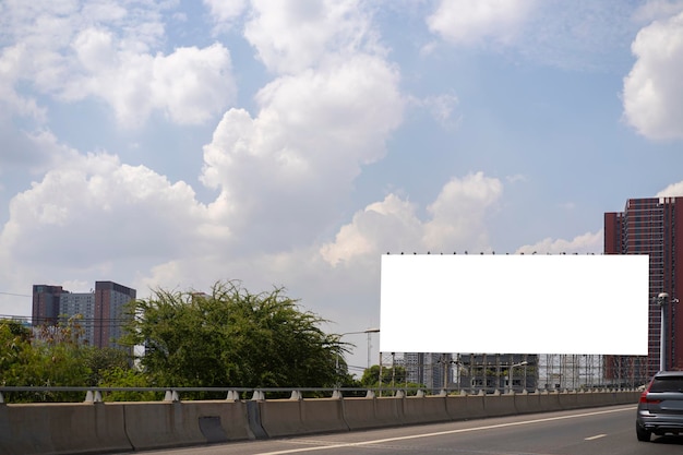 Empty white horizontal billboard on the roadside