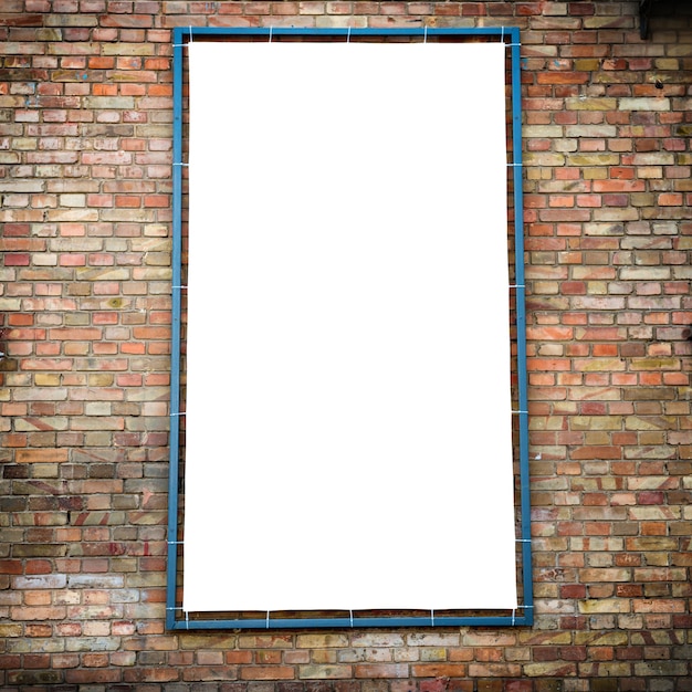 Empty white isolated billboard on the red brick wall