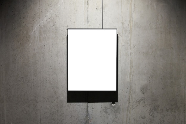 Photo empty white isolated frame on the wall