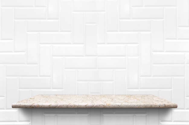 Empty white marble shelf at white ceramic tile wall background