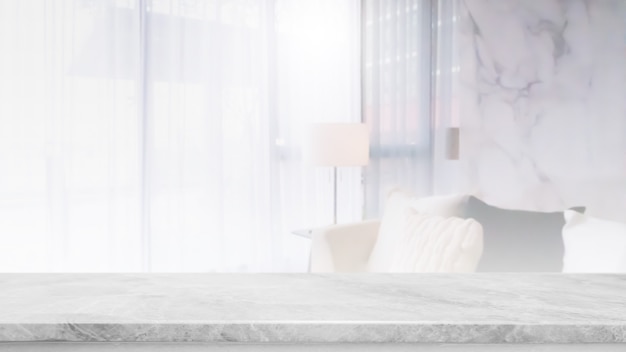 Empty white marble stone table top and blurred living room in home interior with curtain window background. - can used for display or montage your products.