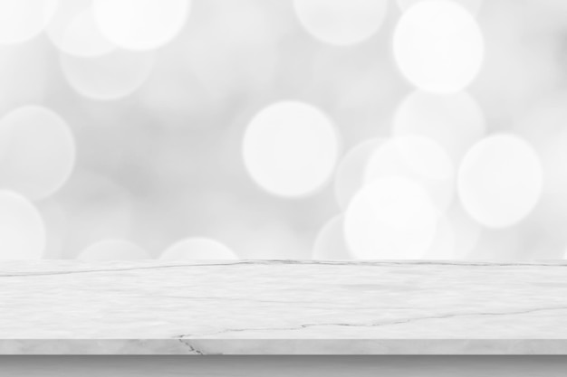 Empty white marble table top with blur bokeh background