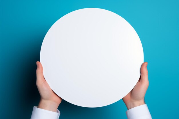 Empty white mockup circle held in hand on blue background