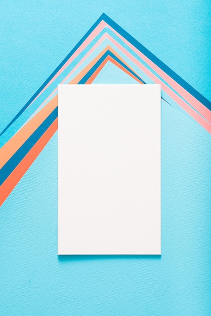 Photo empty white paper sheet on blue background copyspace for message or text letters and correspondence concept