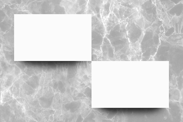 Empty white paper sheet on Grey marble background