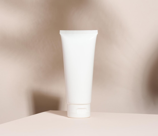 Empty white plastic tubes for cosmetics. Packaging for cream, gel, serum, advertising and product promotion, mock up