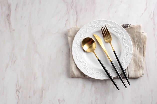 Empty White Plate on Marble Background