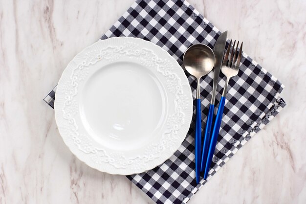 Empty White Plate on Marble Background