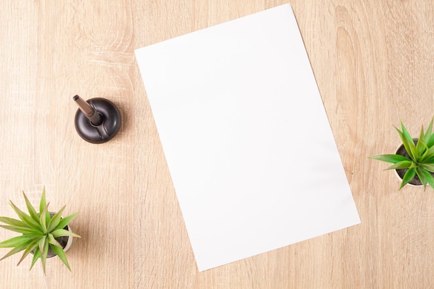 empty white sheet of paper on desk office  
for budget planner