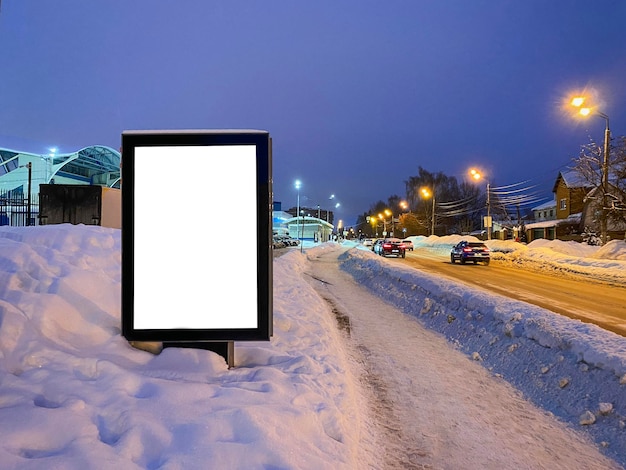 Empty white vertical light box mockup  at night