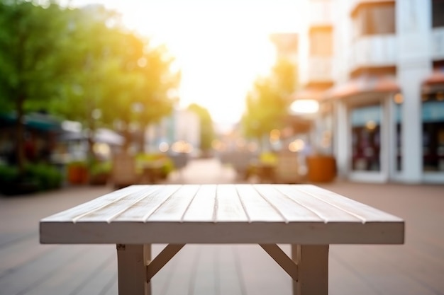 empty white wooden table top with a restaurant in the background