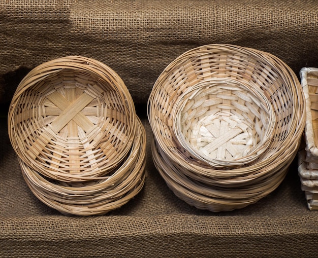 Empty wicker baskets are for sale in a market place