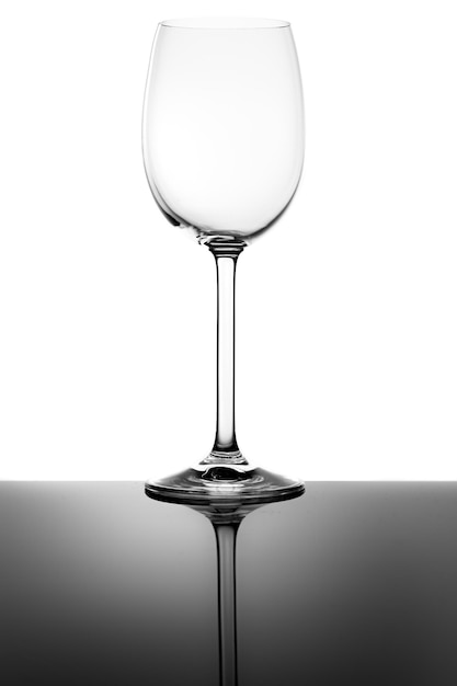 Empty Wine Glass and Reflection Isolated on White