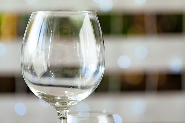 Empty wine glass on a restaurant table