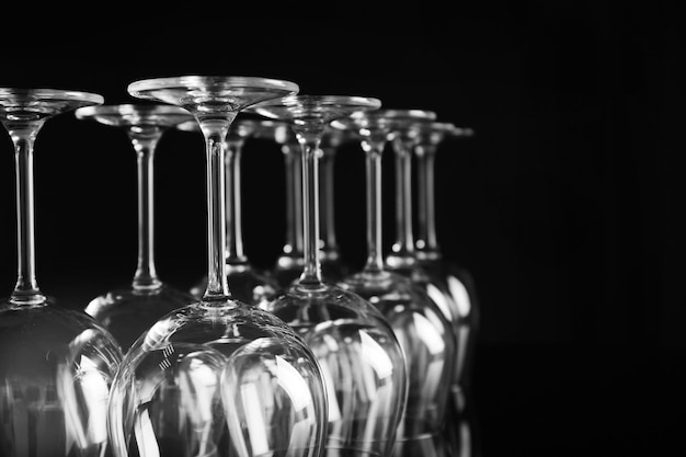 Empty wine glasses on black background closeup