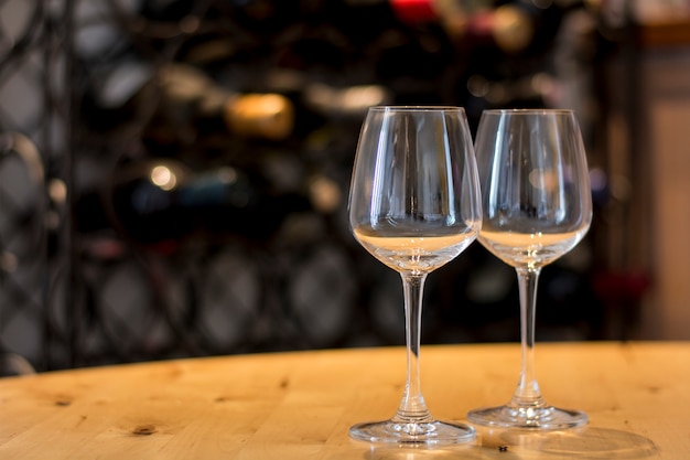 Empty wine glasses on a wooden plank