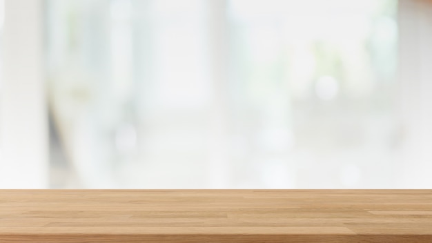 Empty wood table top and blur glass window interior