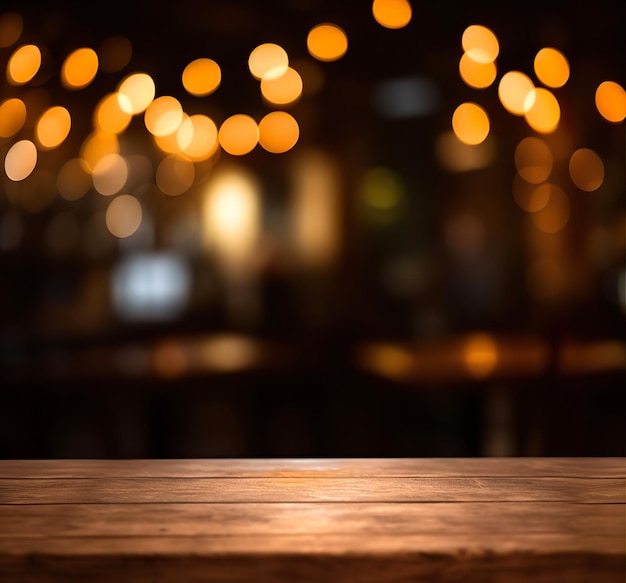 Empty wood table top on blur light gold bokeh of cafe restaurant