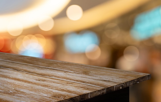 Empty wood table top and blur of out door garden background Empty wooden table space for text marketing promotion blank wood table copy space for background