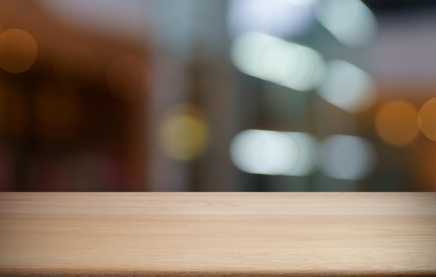 Empty wood table top and blur of out door garden background Empty wooden table space for text marketing promotion blank wood table copy space background